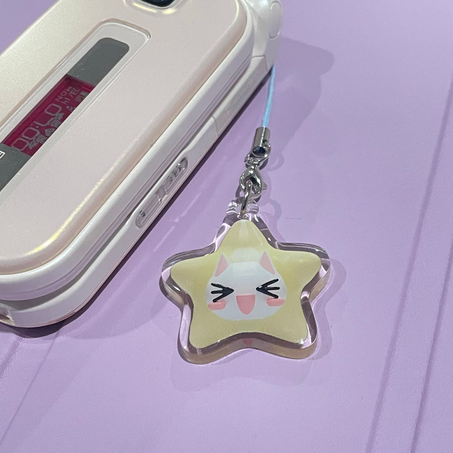 New! Toro Star phone charm