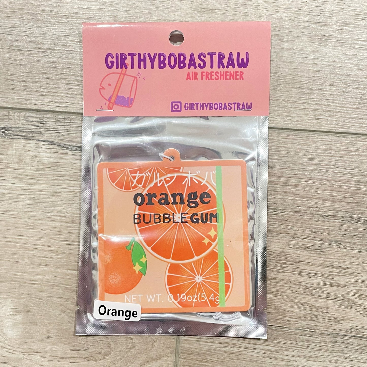 Orange gum air freshener